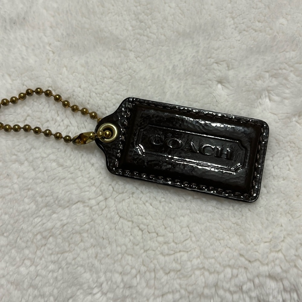 Coach purse tag